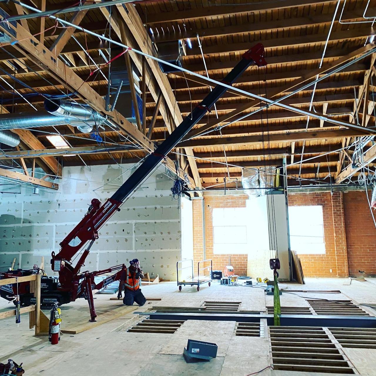 SPYDERCRANE mini crane on an interior renovation