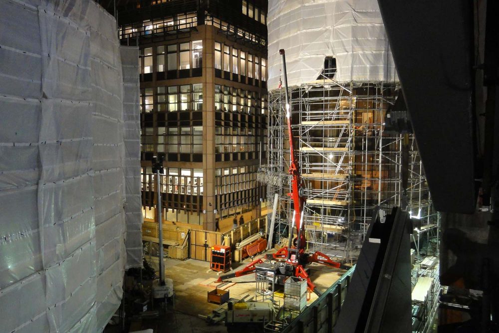 SPYDERCRANE mini crane night jobsite